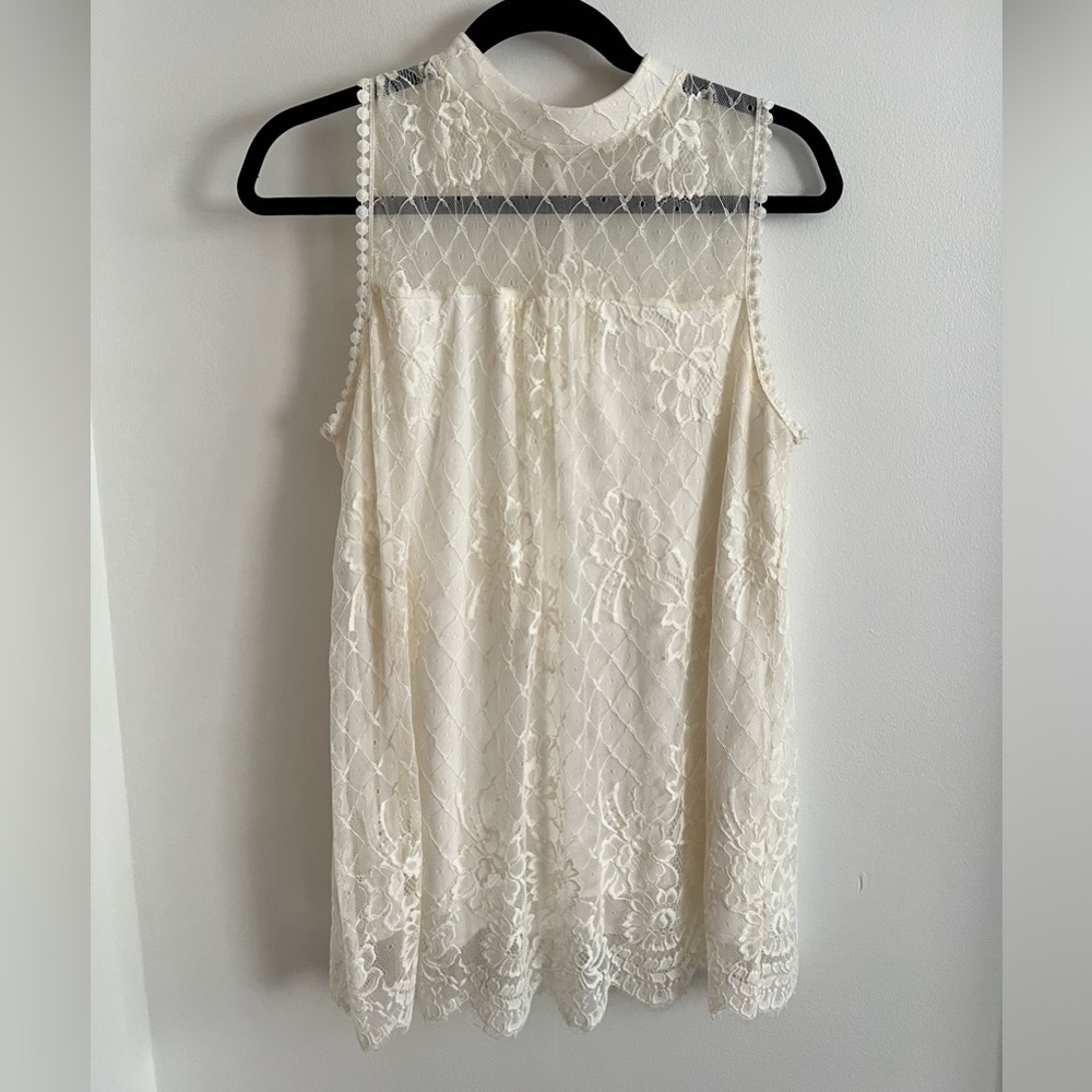 Women’s Large ivory cream sleeves blouse like new.